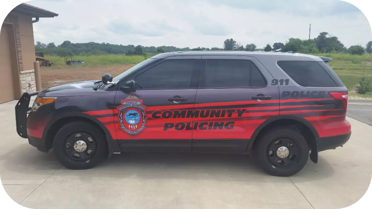 Black and orange Police SUV